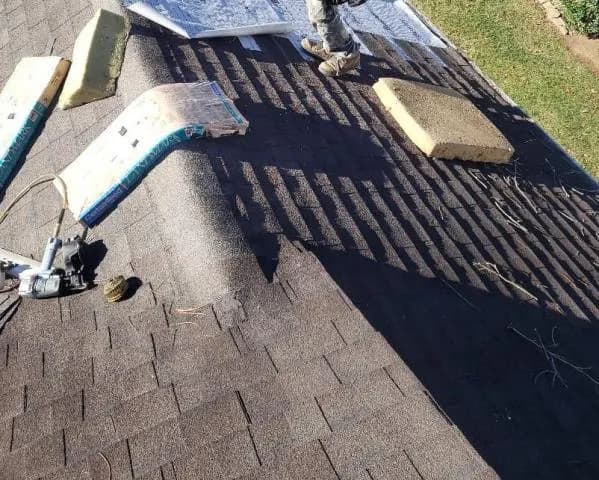 Home in Loudon job photo: after a storm a tree fell on this home in Loudon and damaged the roof we gave a free estimate for a tree repair