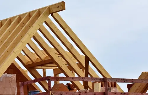 Wood roof trusses framing a new roof