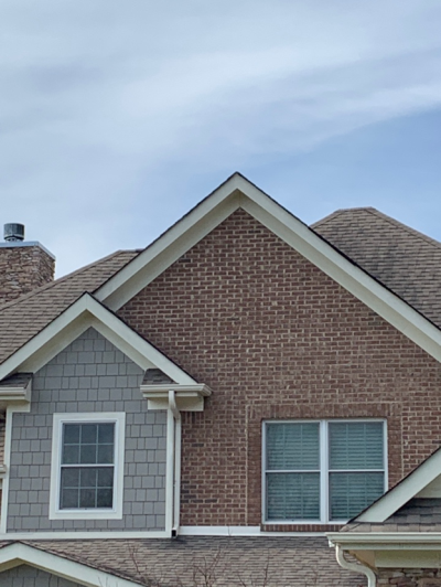 Roof installation on a brick home in Farragut, TN