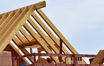 Roof in Knoxville being rebuilt after homeowner skipped annual maintenance.