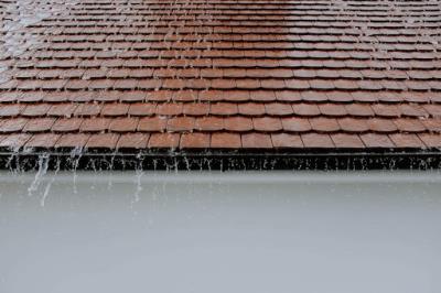 Water running off a freshly repaired tile roof in Lebanon