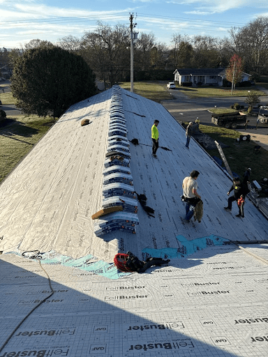 Mobley Brothers Roofing and Renovation LLC roofing crew preparing to shingle a roof in Knoxville.